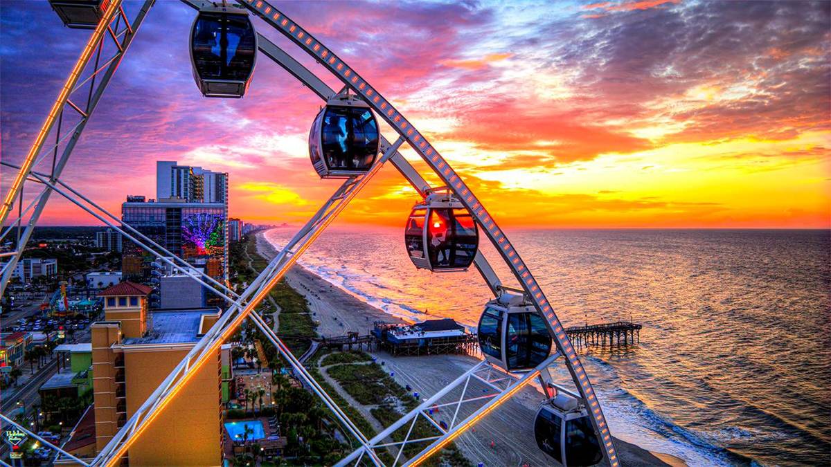 View of the top of the SkyWheel at sunset overlooking Myrtle Beach, South Carolina, USA